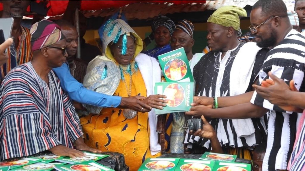 Paramount chief of Wungu distributes exercise books to pupils