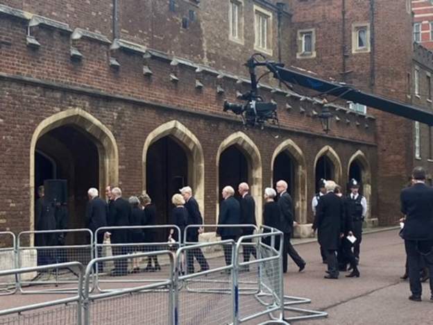 People begin to gather ahead of historic ceremony