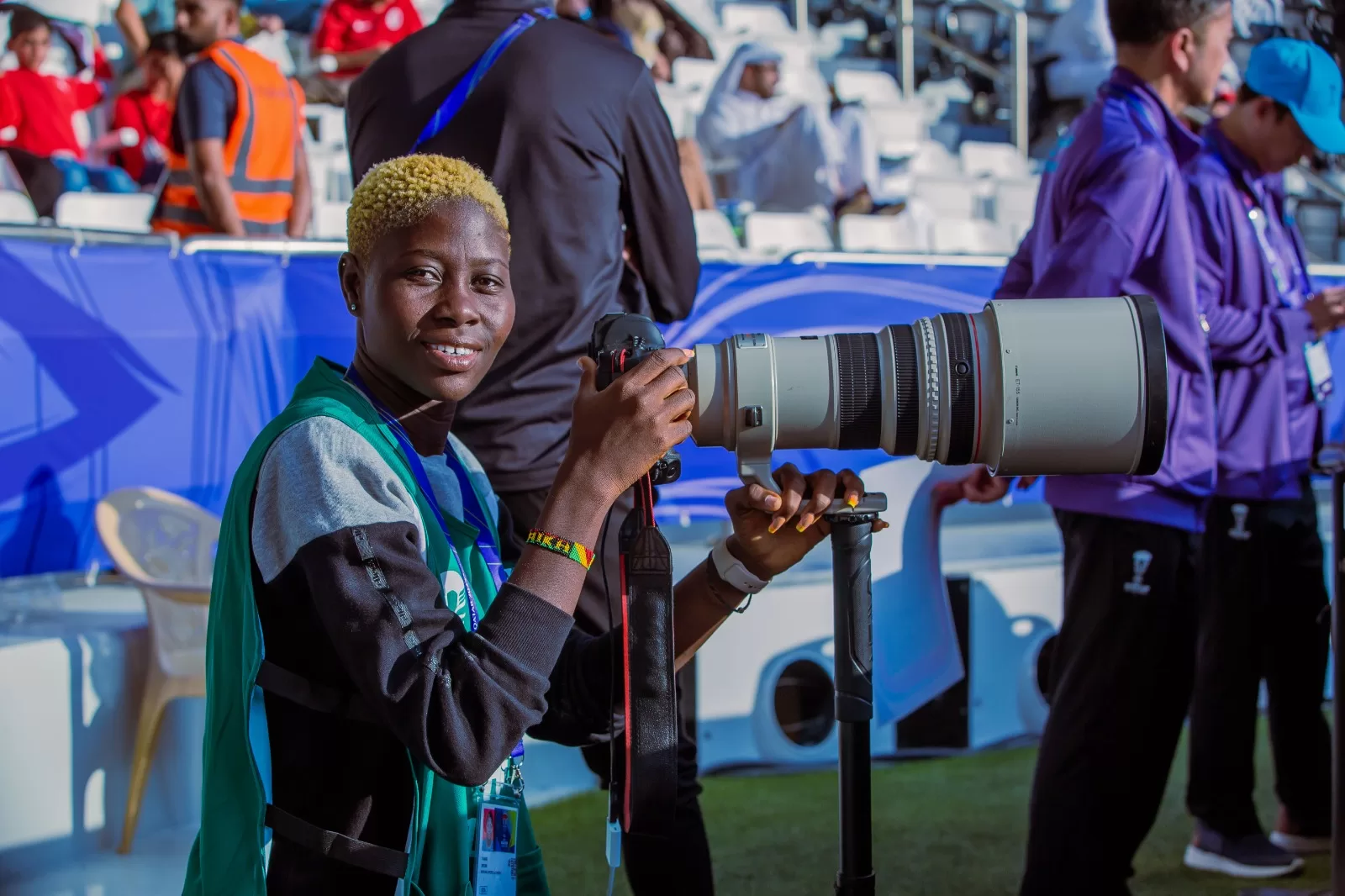 Ghanaian Female Photographer causing stir in Qatar at Asian Cup