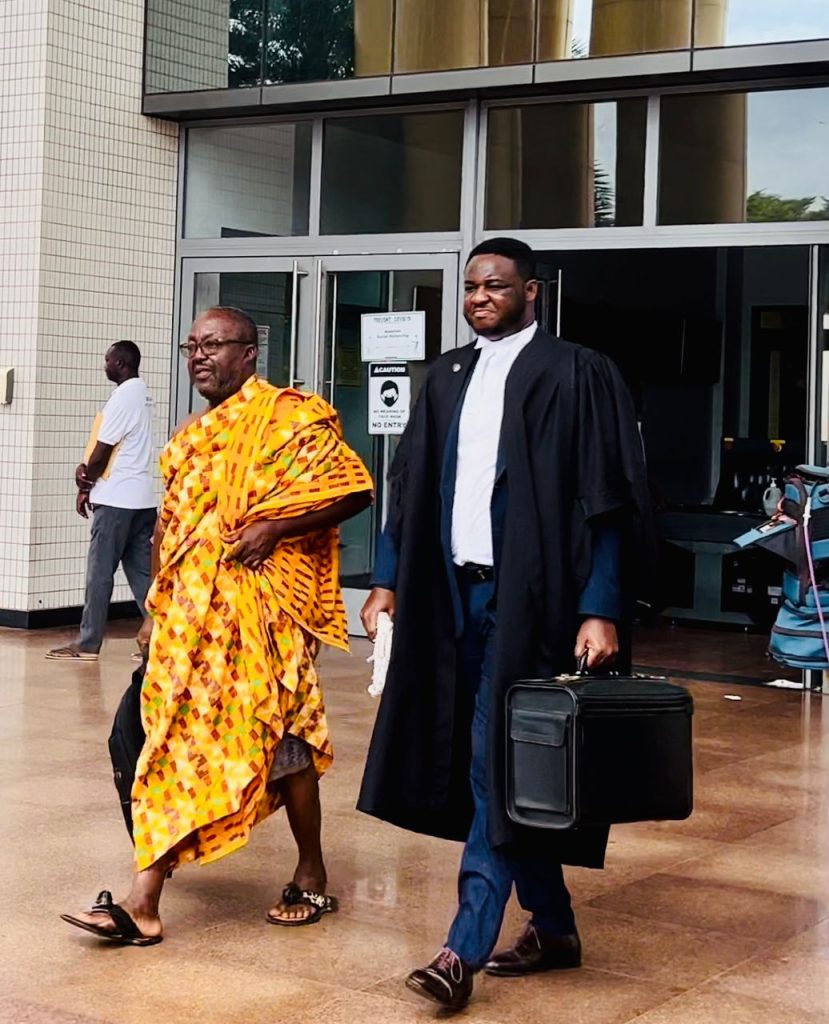 The Plaintiff Paul Boama-Sefa(in Kente) and his Lawyer Brnedict Nii-Kraku