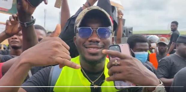 Kalyjay joins #FreeTheCitizens demo; Urges Ghanaians to fight for clean water and freedom